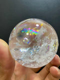 Natural Clear Quartz Sphere with Rainbow Inclusions — Hand-Polished Crystal Ball for Home Decor