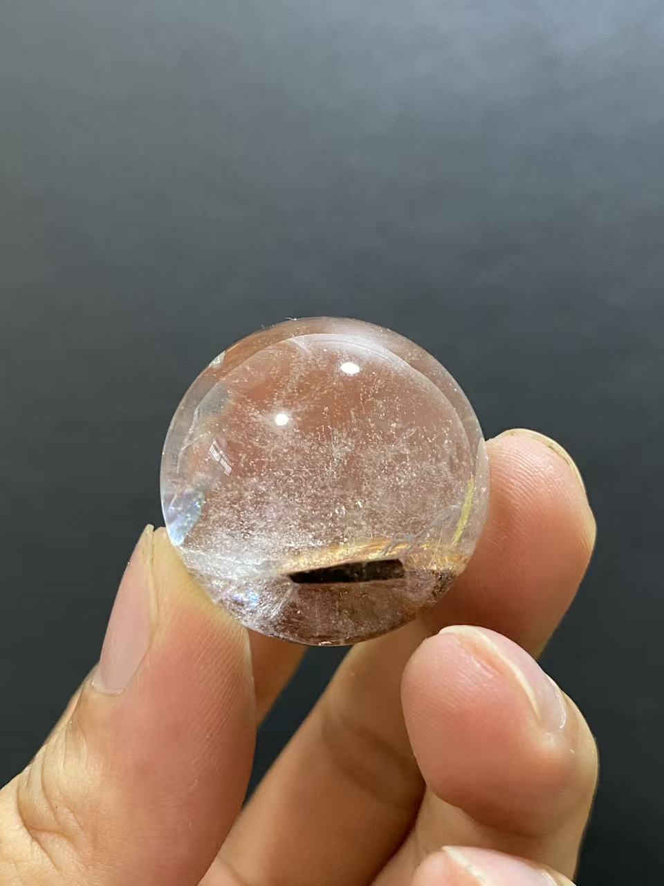 Natural Clear Quartz Sphere with Rubellite Inclusions — Hand-Polished Crystal Ball for Home Decor