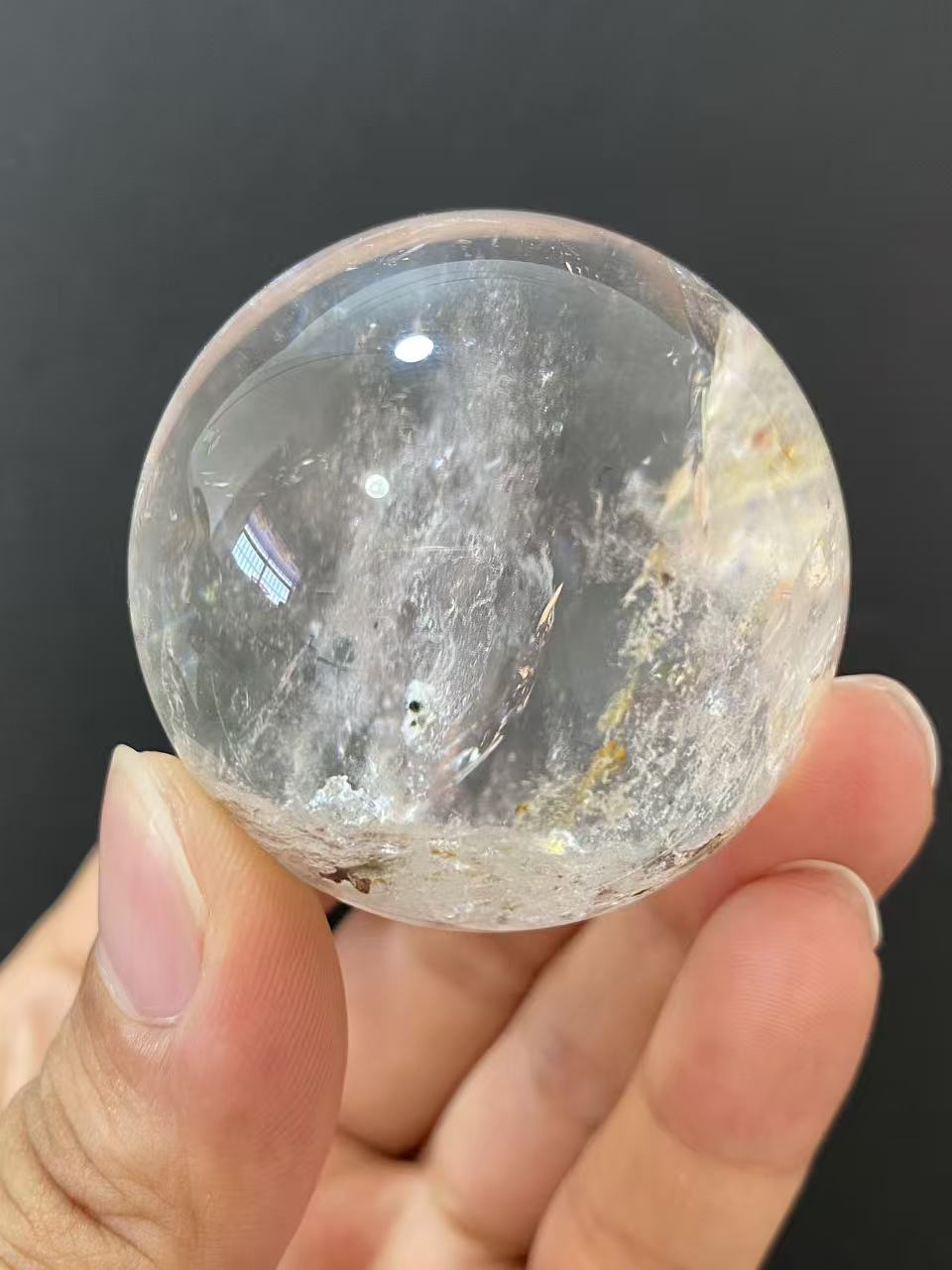 Natural Clear Quartz Sphere with Internal Inclusions for Home Decoration