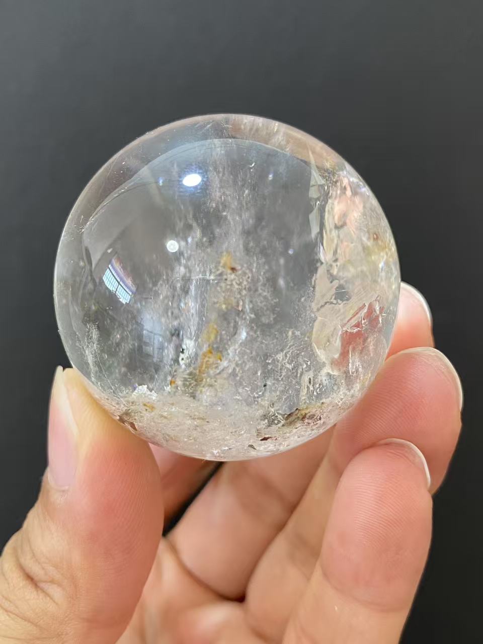 Natural Clear Quartz Sphere with Internal Inclusions for Home Decoration