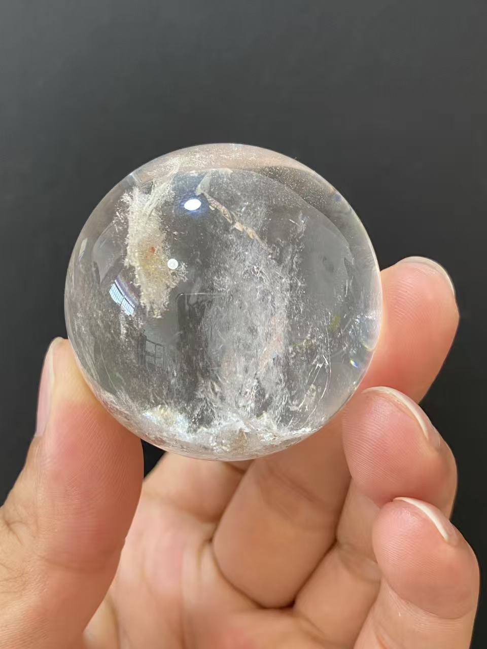 Natural Clear Quartz Sphere with Internal Inclusions for Home Decoration