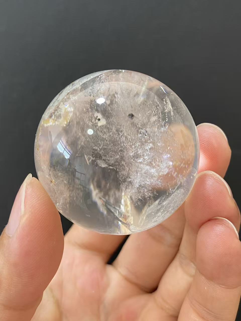 Natural Clear Quartz Sphere with Internal Inclusions for Home Decoration
