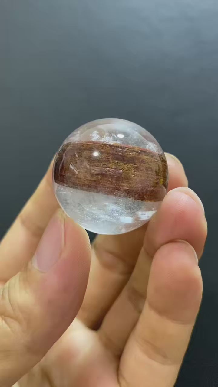 Natural Clear Quartz Sphere with Rubellite Inclusions — Hand-Polished Crystal Ball for Home Decor